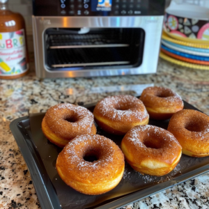 Fluffy Air Fryer Donuts yassine_31845_httpss.mj.runF5qxp1k_hOI_AIR_FRYER_DONUTS_e783dadb-82aa-4402-835f-f20db4494286_0