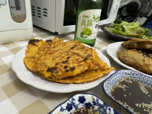 Kimchi Pancakes: Discover the Crispy Delight Today! kimchi-pancakes-v0-cr7x6oztkcde1