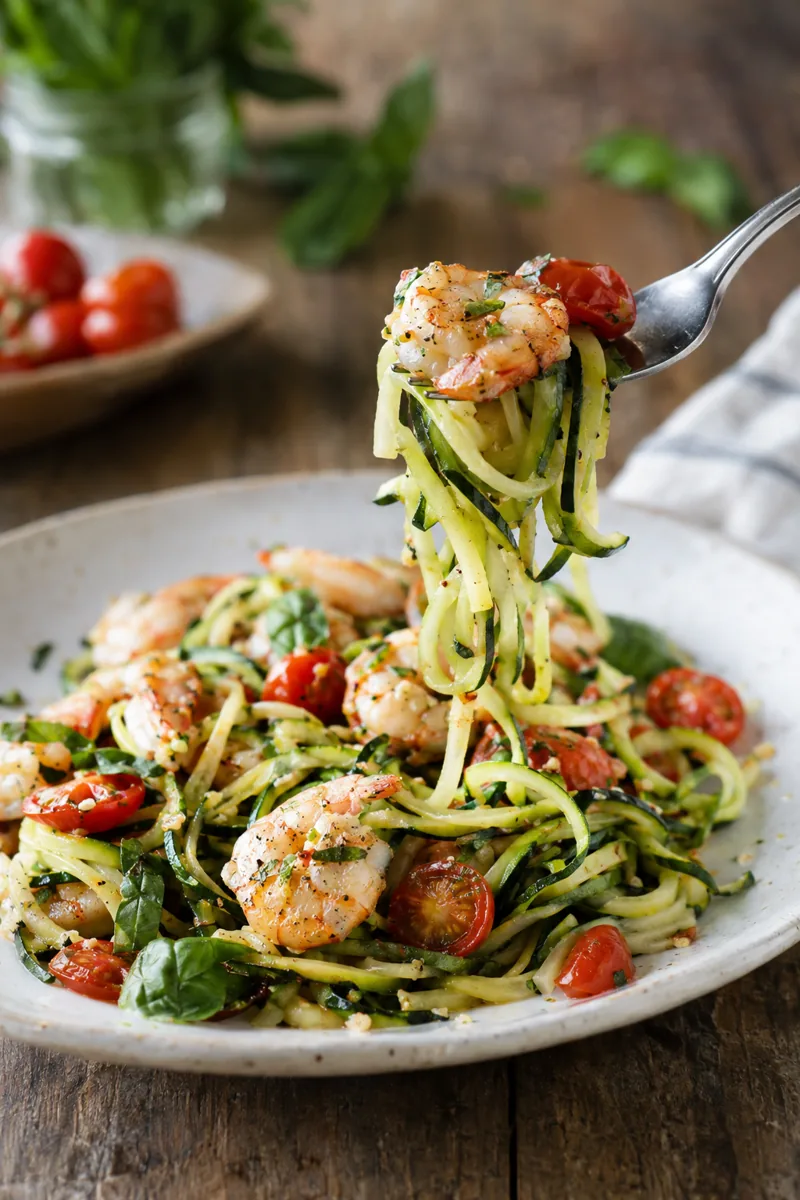 forkful of zucchini noodles with garlic shrimp